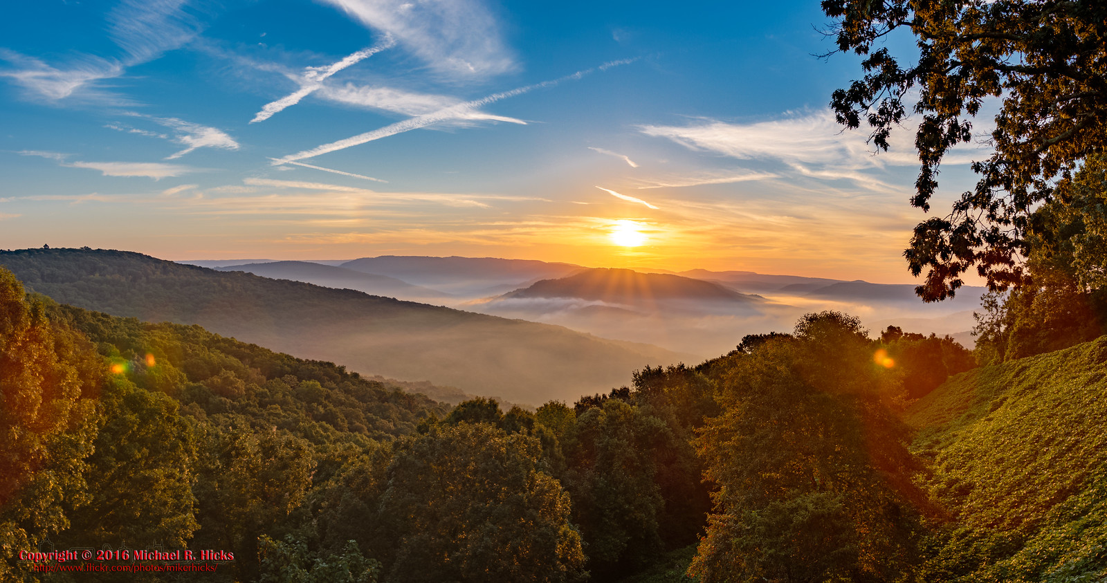 Arkansas blue mountain landscape at dusk — Ruby's Air HVAC serving Central Arkansas